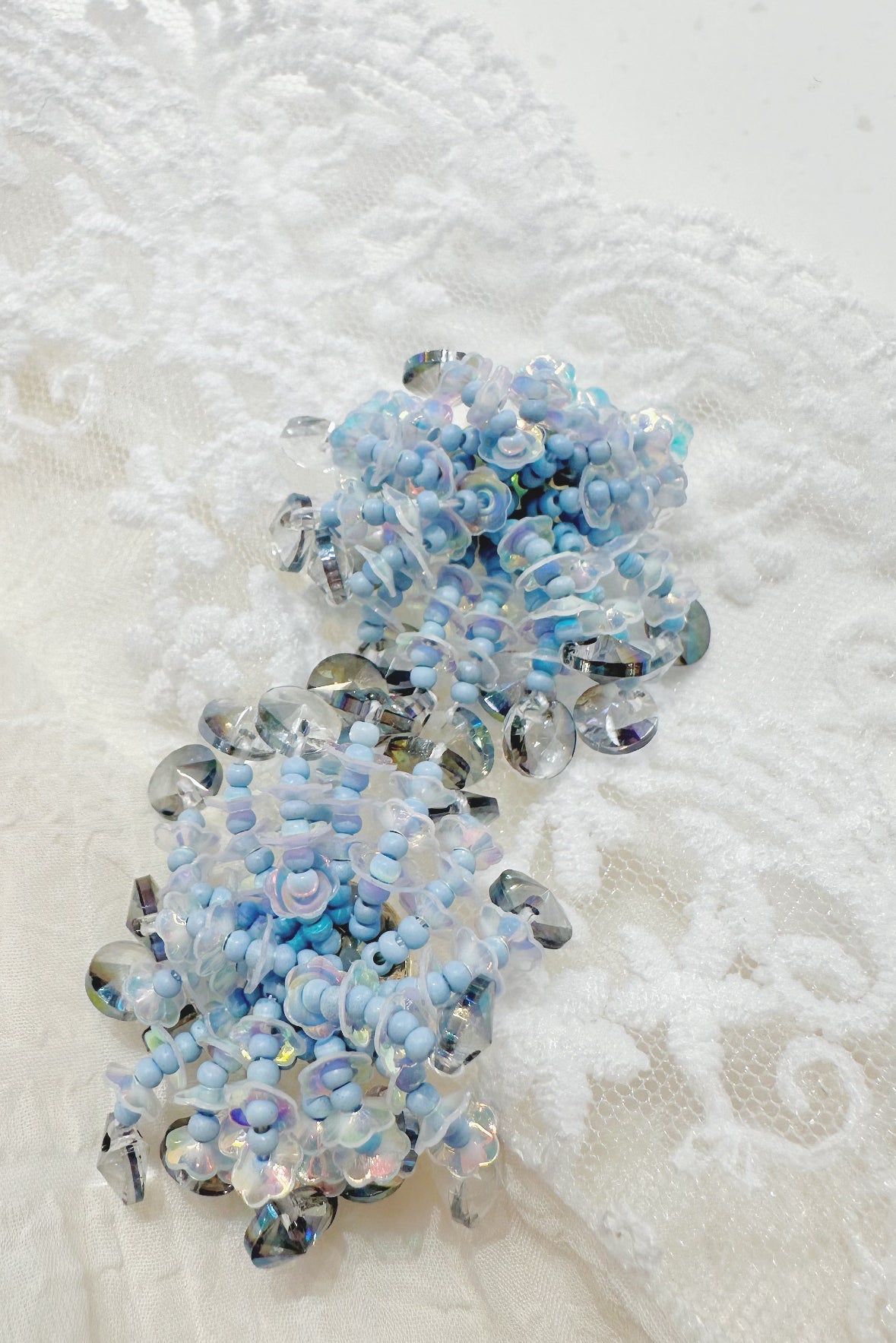 blue shiny snowflake earrings