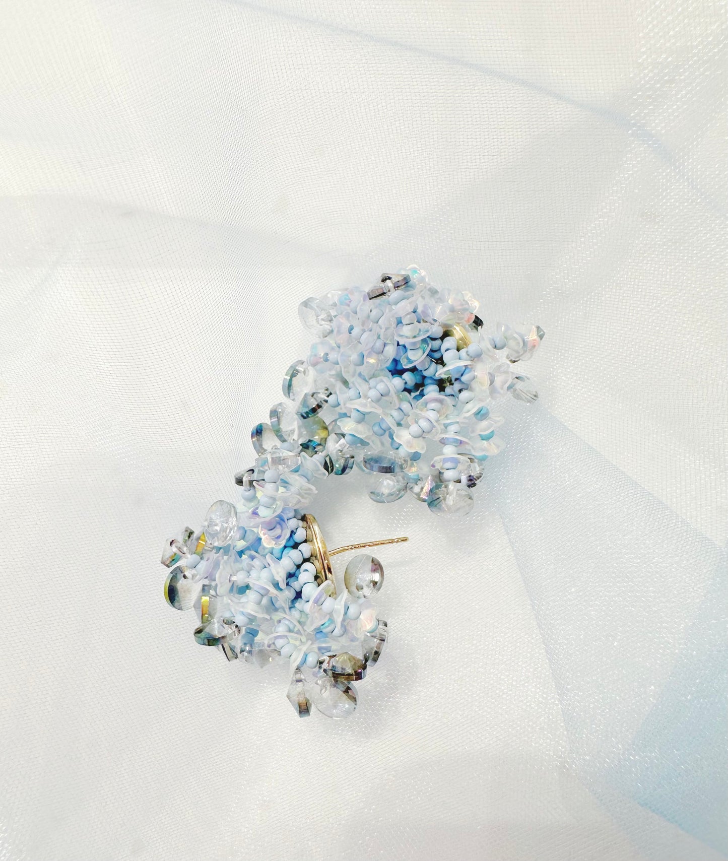 blue shiny snowflake earrings