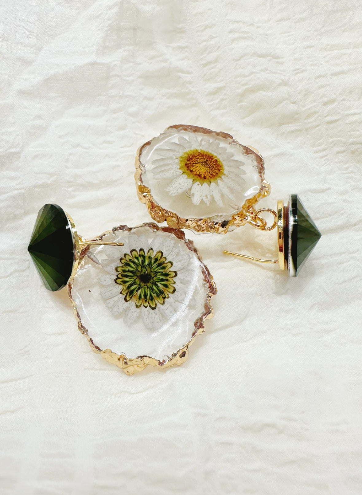 gold rimmed flower earrings
