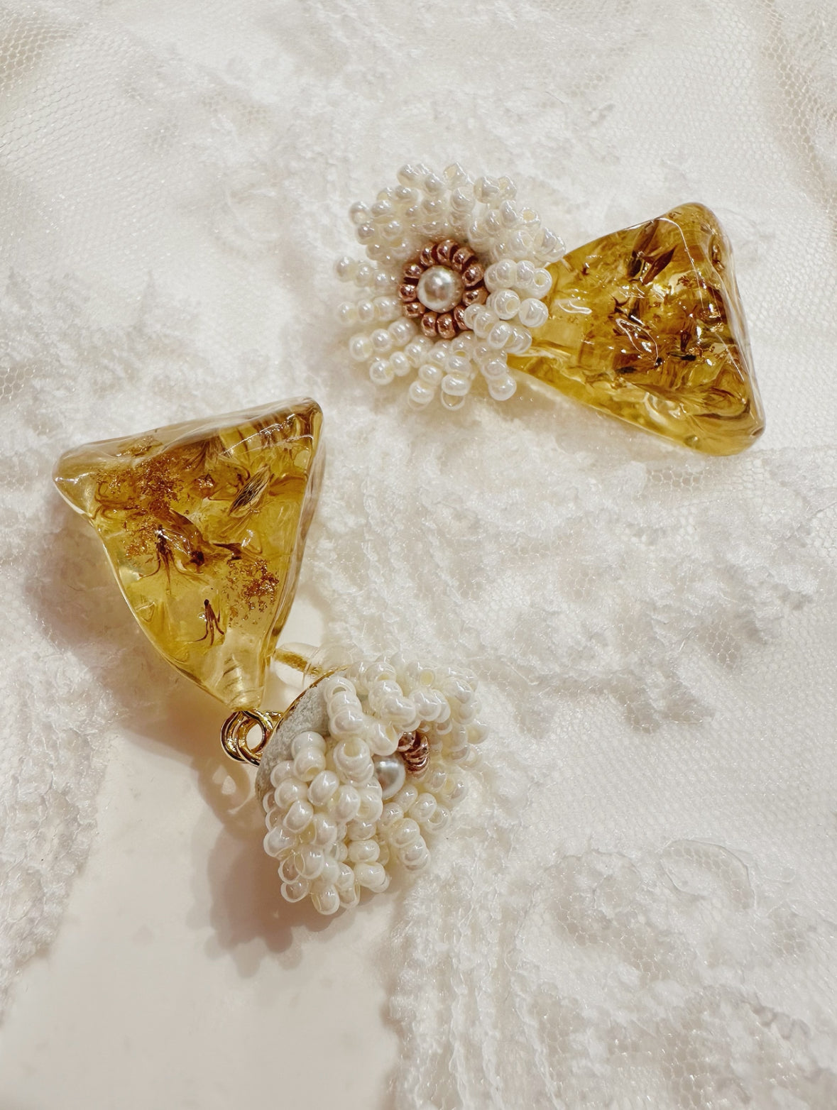 white and gold flower earring