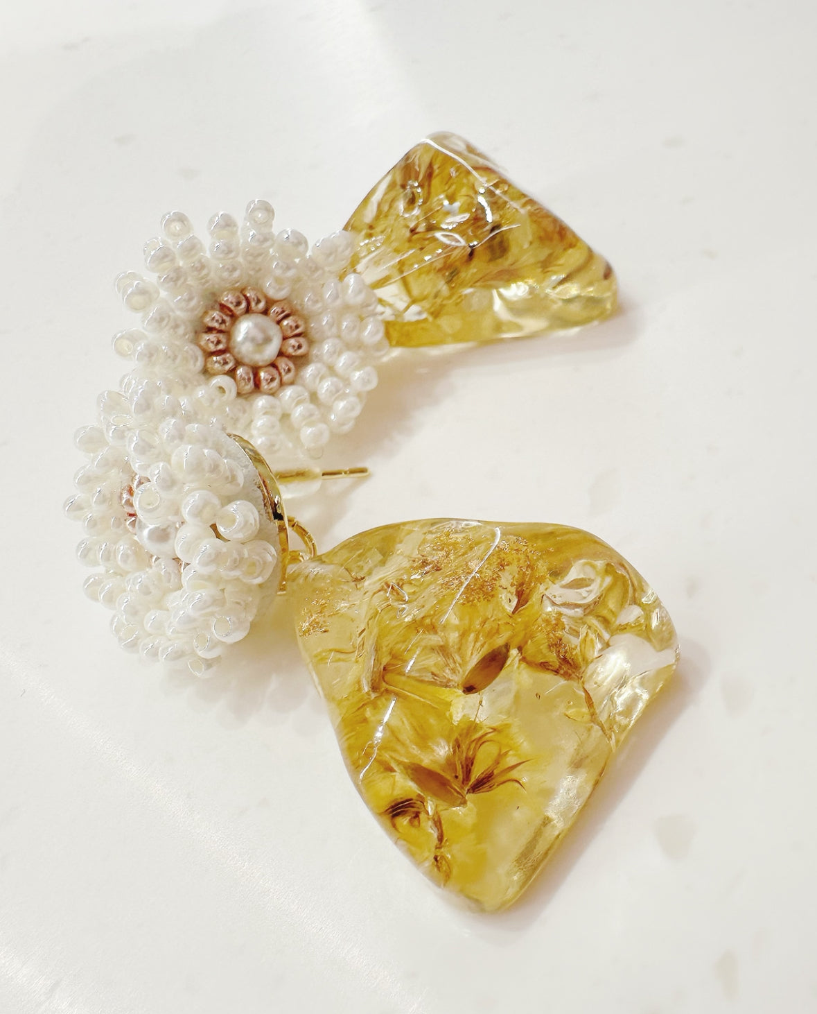white and gold flower earring