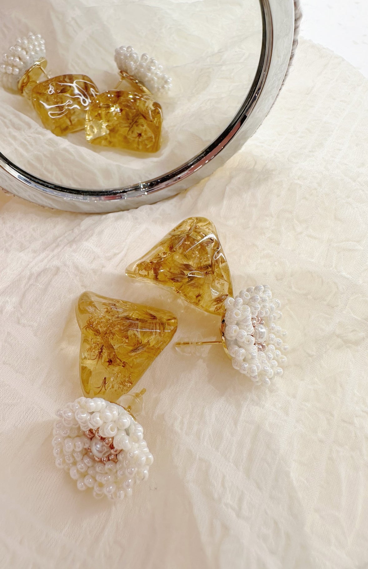 white and gold flower earring