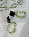 Green loop earrings