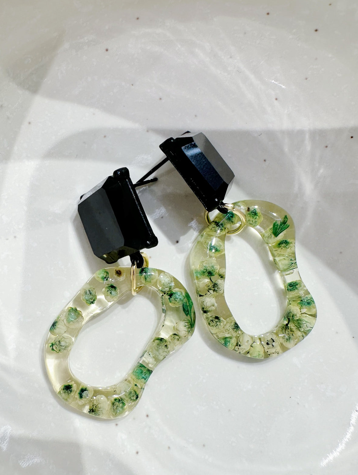 Green loop earrings