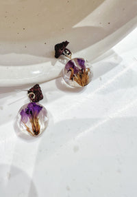 purple crystalised coin